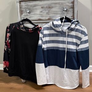 Blue and White Sweatshirt
Black and flowered sweatshirt